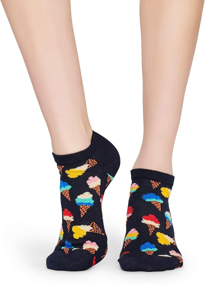 Quirky Black socks with colorful ice cream cone pattern worn by a person on a white background