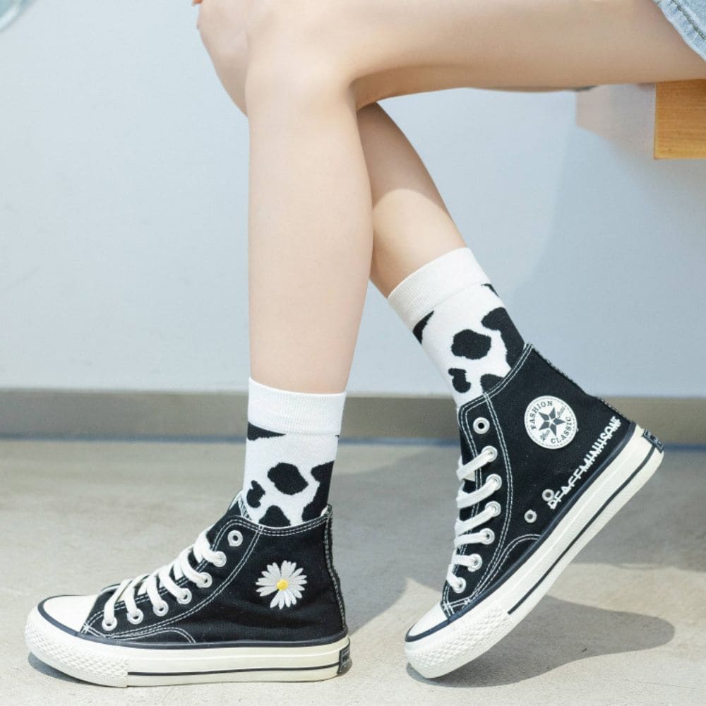 Black N White Cow & Zebra Unisex Crew Socks (pack of 2) from lazzy socks.