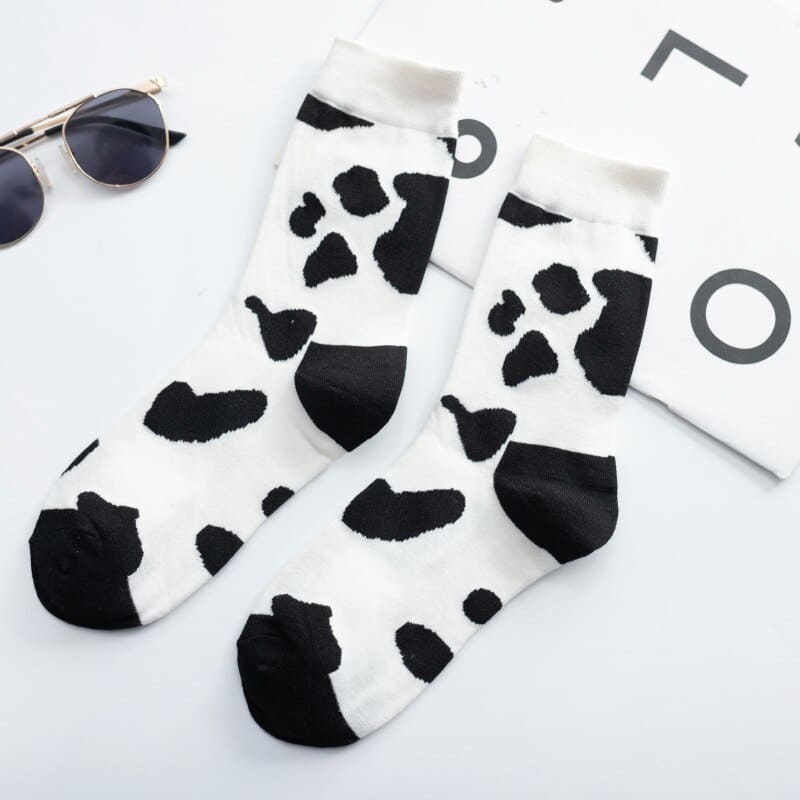 Black N White Cow & Zebra Unisex Crew Socks (pack of 2) from lazzy socks.