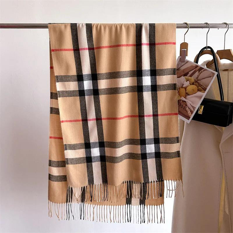 Beige checkered scarf with fringe on a rack against a white background
