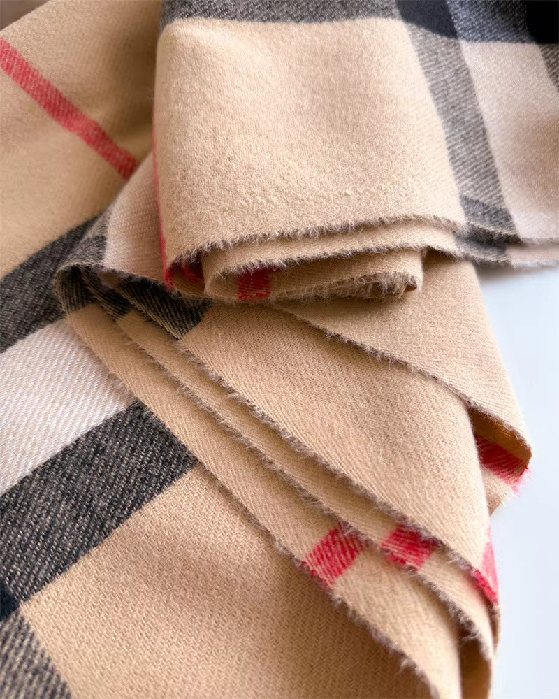 Close-up of a checkered fabric with beige, red, and black colors.
