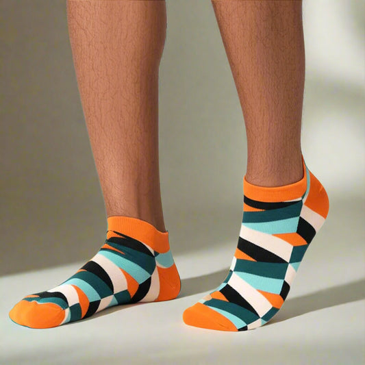 Colorful striped socks worn by a person on a white background