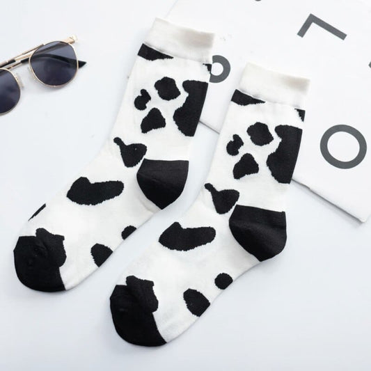 Black N White Cow & Zebra Unisex Crew Socks (pack of 2) from lazzy socks. 